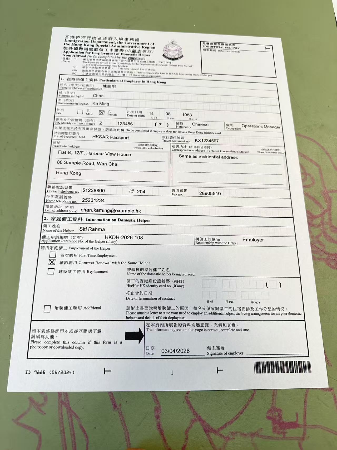 Dense bilingual document photo with many fields and labels